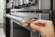 KitchenAid® New Gold Commercial-Style Range Handle Medallion Kit-4