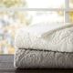Olliix by Madison Park Norfolk Ivory 50x60" Polyester Embroidery Solid Ultra Plush Throw-1