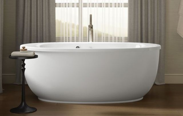 KOHLER® Sunstruck® White 65-1/2" x 35-1/2" Oval Freestanding Bath with Bask® Heated Surface and Fluted Shroud-3