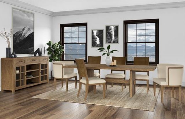front view of a modern dining room with a long wooden rectangular dining table and a matching sideabord