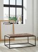 Signature Design by Ashley® Junsor Black/Brown Cocktail Ottoman-1