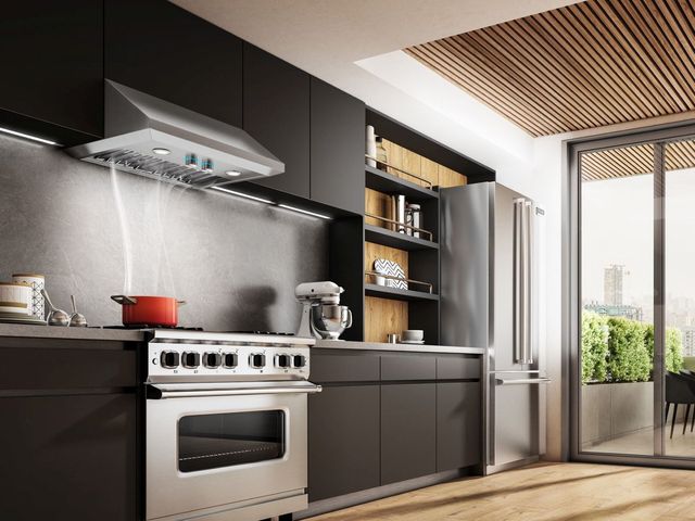 View of a modern kitchen with an Elica Pro Series under cabinet range hood 