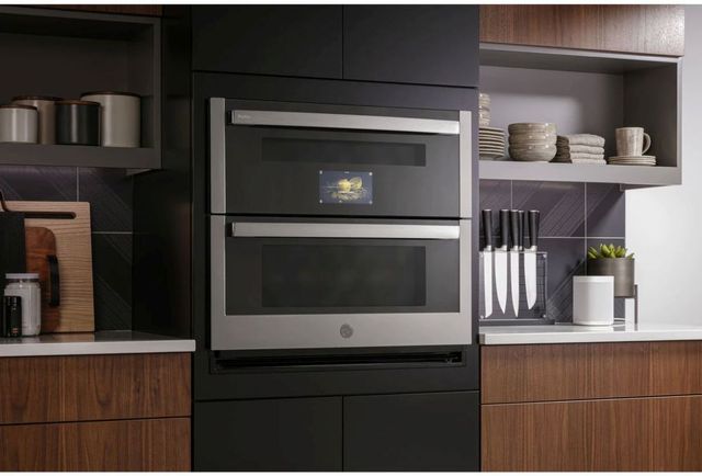 Front view of a GE Profile double wall oven in a modern kitchen