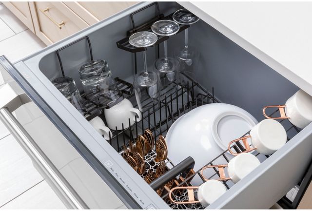 top view of a dishwasher drawer pulled out to show inside