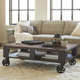 Magnussen Home® Pinebrook Distressed Natural Pine Rectangular Cocktail Table with Black Metal Casters-3