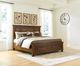 Signature Design by Ashley® Havenstein Warm Brown King Panel Storage Bed-1