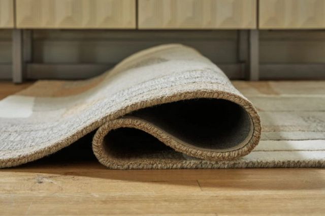 Signature Design by Ashley® Abbotton Caramel/Gray/Taupe 5'x7' Area Rug-1