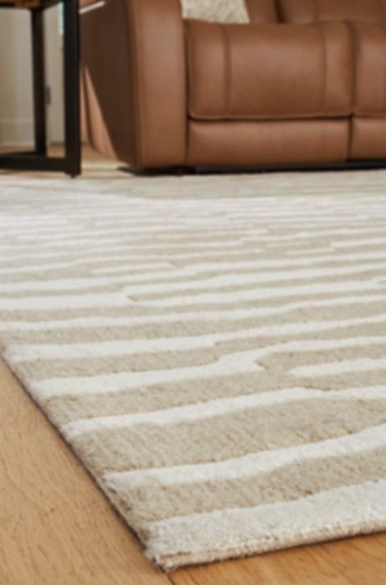 Signature Design by Ashley® Corrbell Beige/White 5'x7' Medium Area Rug-1