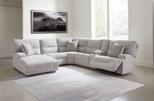front view of a grey sectional in a modern living room