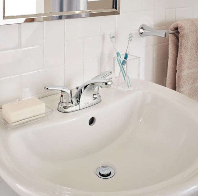American Standard Colony® PRO Polished Chrome 4" Centerset 2-Handle Bathroom Faucet Less Drain with Lever Handles-1