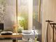 Hansgrohe Metropol Brushed Nickel 4" Single-Hole Faucet with Loop Handle and Pop-Up Drain-1