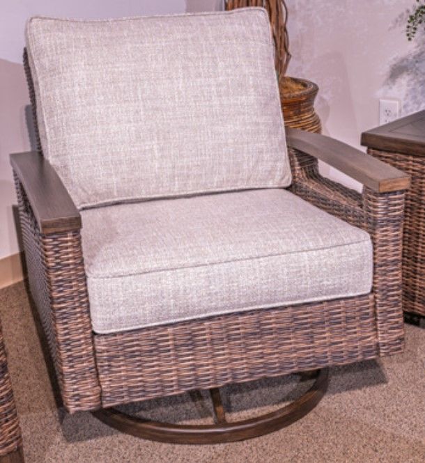 Signature Design by Ashley® Monterey Point Beige/Dark Brown Fabric/Wicker Rattan Outdoor Swivel Lounge Chair-1