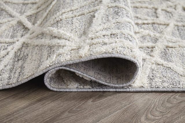 Signature Design by Ashley® Violasen Beige 5'x7' Medium Area Rug-1