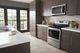 Whirlpool® 1.7 Cu. Ft. Fingerprint Resistant Stainless Steel Over The Range Microwave-4