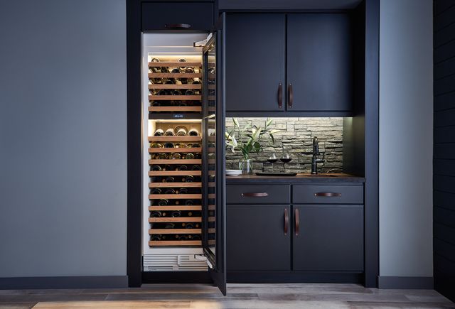 Front view of a modern Sub-Zero wine column in a modern bar area.