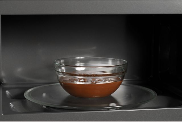 Café™ 2.1 Cu. Ft. Stainless Steel Over The Range Microwave-4