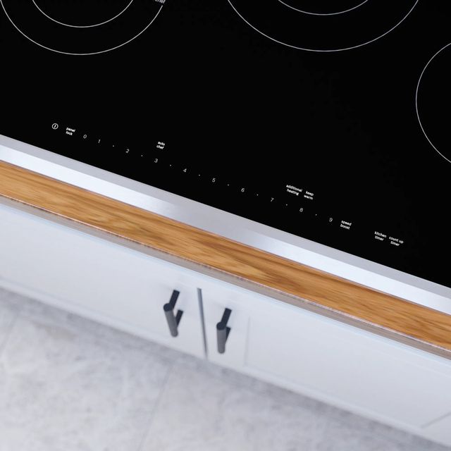 Bosch Benchmark® 30" Black and Stainless Steel Electric Cooktop-3