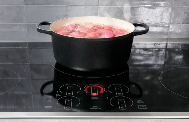 Credit: GE Profile Front view of a pot of red potatoes boiling on an induction cooktop