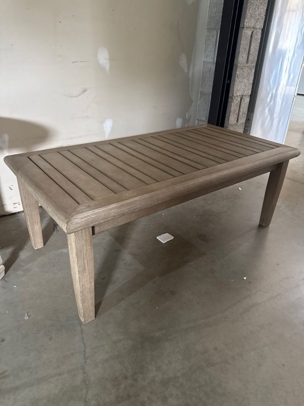 Clearance Signature Design by Ashley® Gerianne Grayish Brown Wooden Outdoor Cocktail Table-0