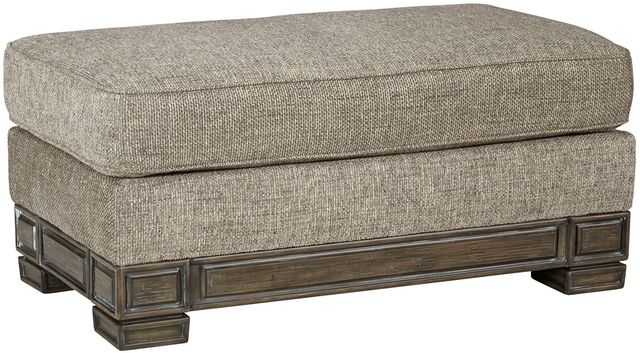Signature Design by Ashley® Einsgrove Sandstone Ottoman-0