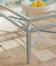 Tommy Bahama® Outdoor Silver Sands Oyster Shell Rectangular Cocktail Table with Glass Top-1