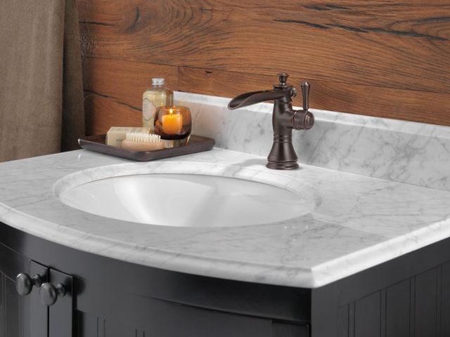 Delta Cassidy® Venetian Bronze Single Handle Channel Bathroom Faucet with Drain-2