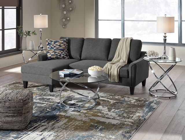front view of a grey chaise sofa bed in a contemporary living room
