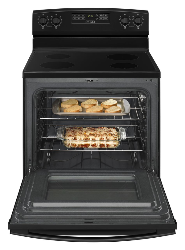 Amana 30” Black Freestanding Electric Range with Essex cabinets in White