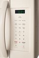 Frigidaire® Over The Range Microwave-Bisque-1
