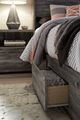 Signature Design by Ashley® Baystorm Gray Queen Storage Panel Bed with 4 Storage Drawers-4