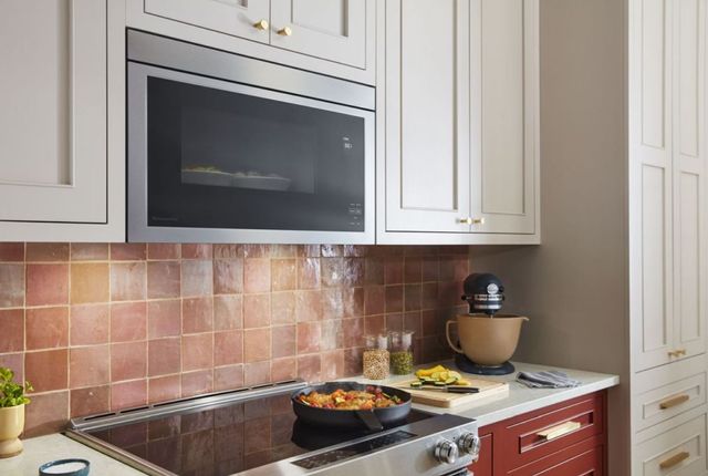 KitchenAid® 1.1 Cu. Ft. Stainless Steel Over The Range Microwave-8