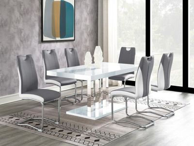 front view of the Coaster® Brooklyn 5-piece White/Chrome Dining Set in a modern dining room