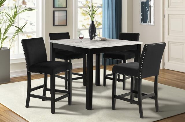 Credit: New Classic Home Furnishings Front view of a contemporary dining room with a black dining room set.