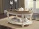 Signature Design by Ashley® Realyn Brown Oval Coffee Table with Antique White Base-4