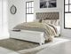 Benchcraft® Kanwyn Whitewash King Upholstered Panel Storage Bed-3