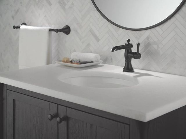 Delta Cassidy® Matte Black Single Handle Channel Bathroom Faucet with Drain-1