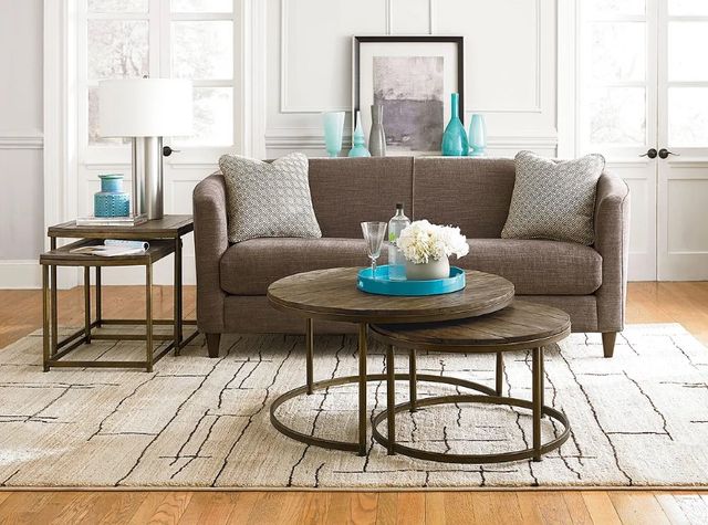Hammary® Leone Weathered Barn Round Nesting Cocktail Table Set with Antique Brass Base-1