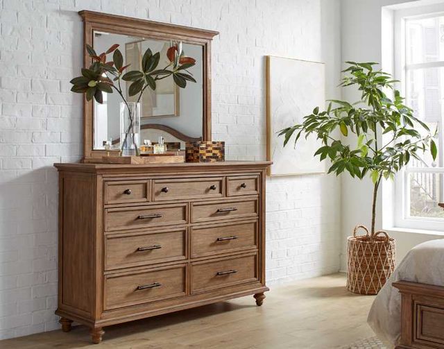 Styled dresser top with mirror and decor Styled dresser top with mirror and decor