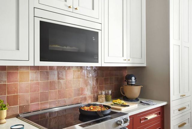 KitchenAid® 1.1 Cu. Ft. White Over The Range Microwave -8