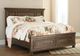 Signature Design by Ashley® Flynnter Medium Brown King Storage Panel Bed-2