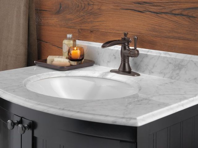 Delta Cassidy® Venetian Bronze Single Handle Channel Bathroom Faucet with Drain-3