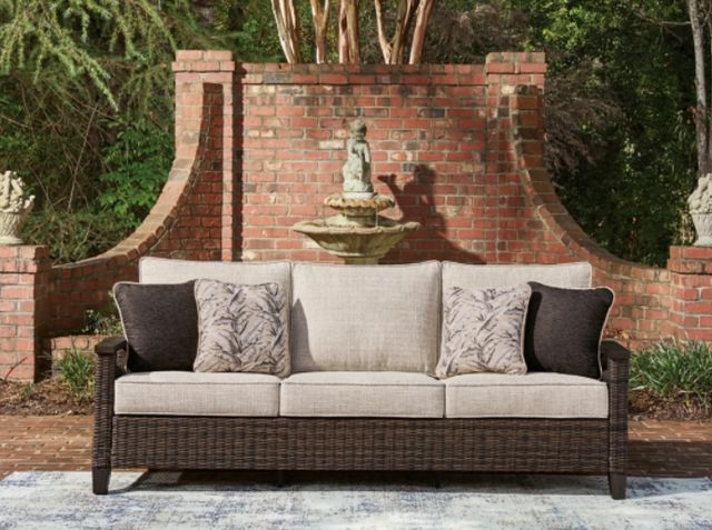 Signature Design by Ashley® Monterey Point Beige/Dark Brown Fabric/Wicker Rattan Outdoor Sofa-1