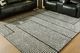 Signature Design by Ashley® Kurtmen Black/Ivory 5'x7' Area Rug-3