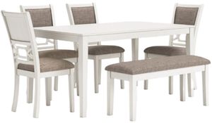 Front view of the Signature Design by Ashley® Erinberg 6-Piece Antique White Dining Set