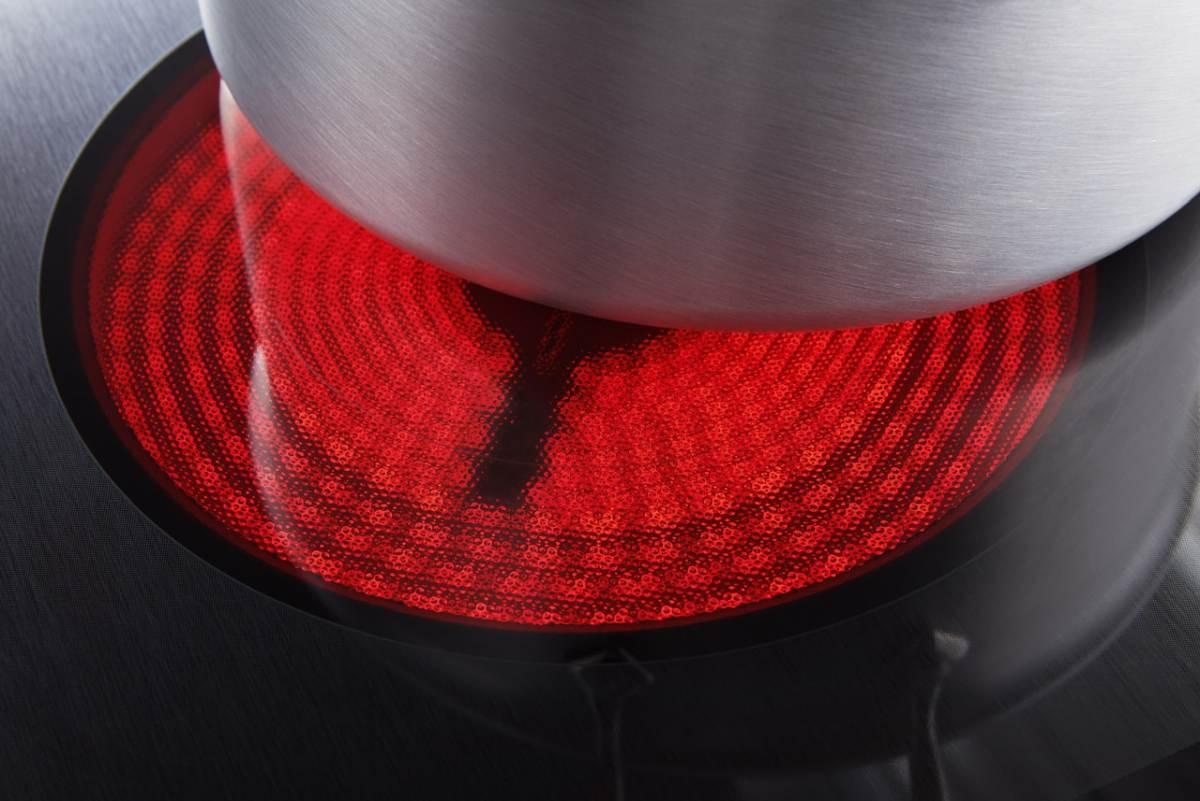 Close up view of a smoothtop electric cooktop surface