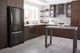 Whirlpool® 33" 22.1 Cu. Ft. Black Stainless Steel Bottom Freezer Refrigerator-1