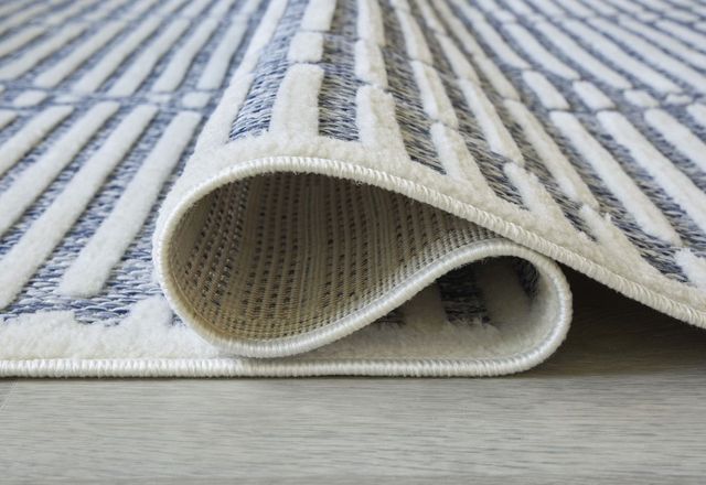 Signature Design by Ashley® Finnlett Cream/Blue 5'x7' Medium Area Rug-1