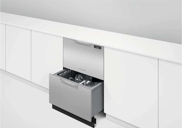 Side view of a Fisher & Paykel double drawer dishwasher with the bottom drawer pulled out.
