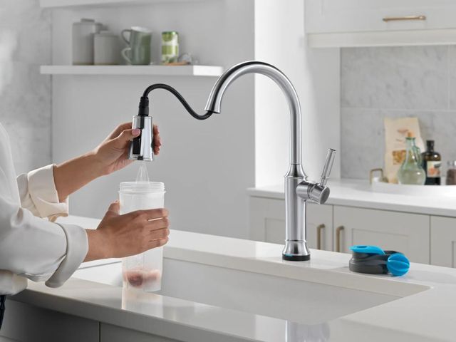 Delta Renaldi® Lumicoat® Arctic Stainless Touch2O® Technology Spring Kitchen Faucet with Touchless Technology-2