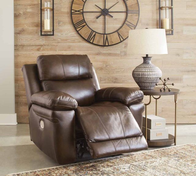 view of a brown leather recliner in a modern living room